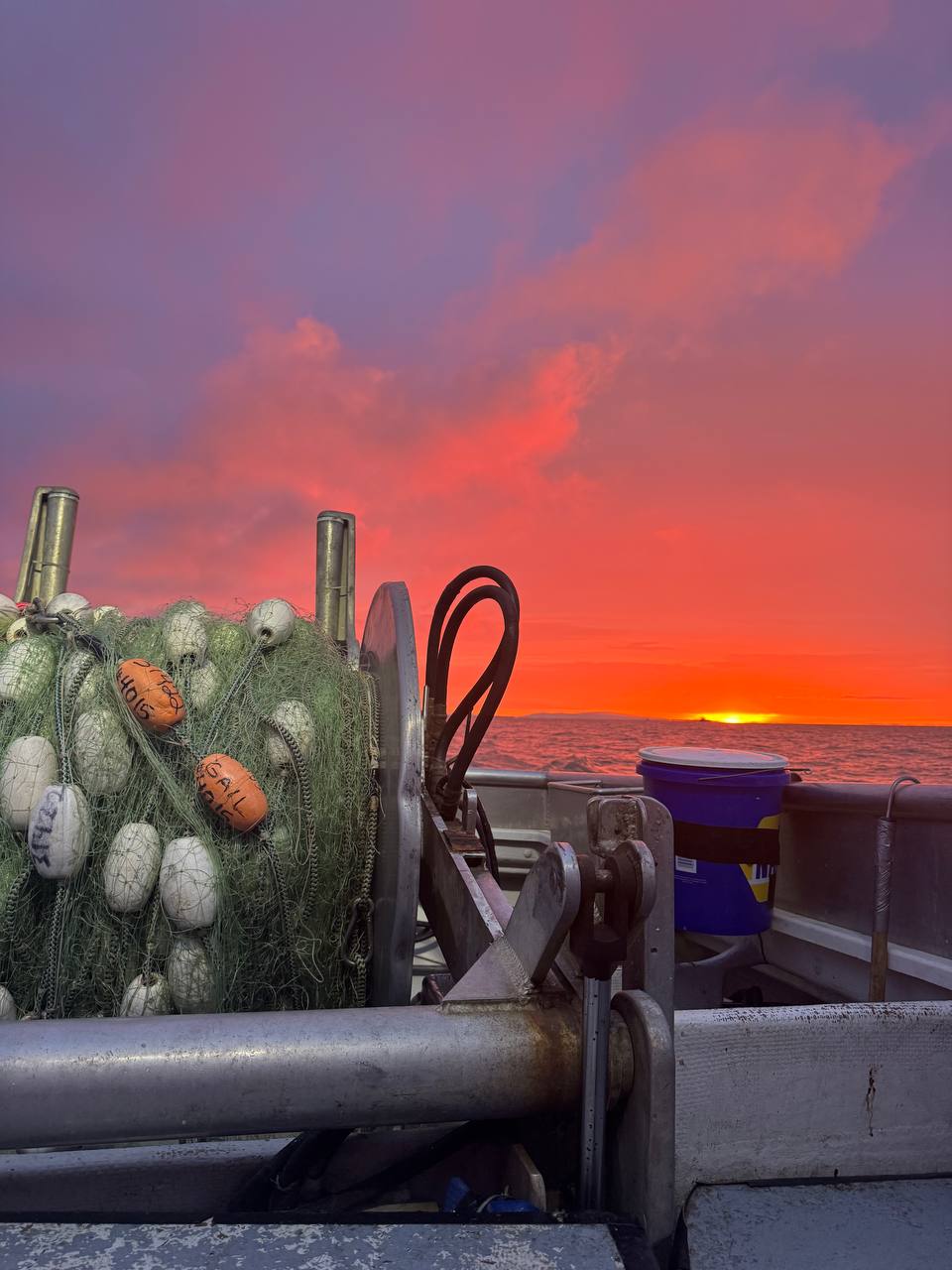 Beautiful red sunset past the net reel